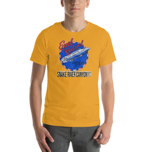 Evel Knievel® Snake River Canyon 1974 tee in mustard, front view showing the red script lettering and block date stamp